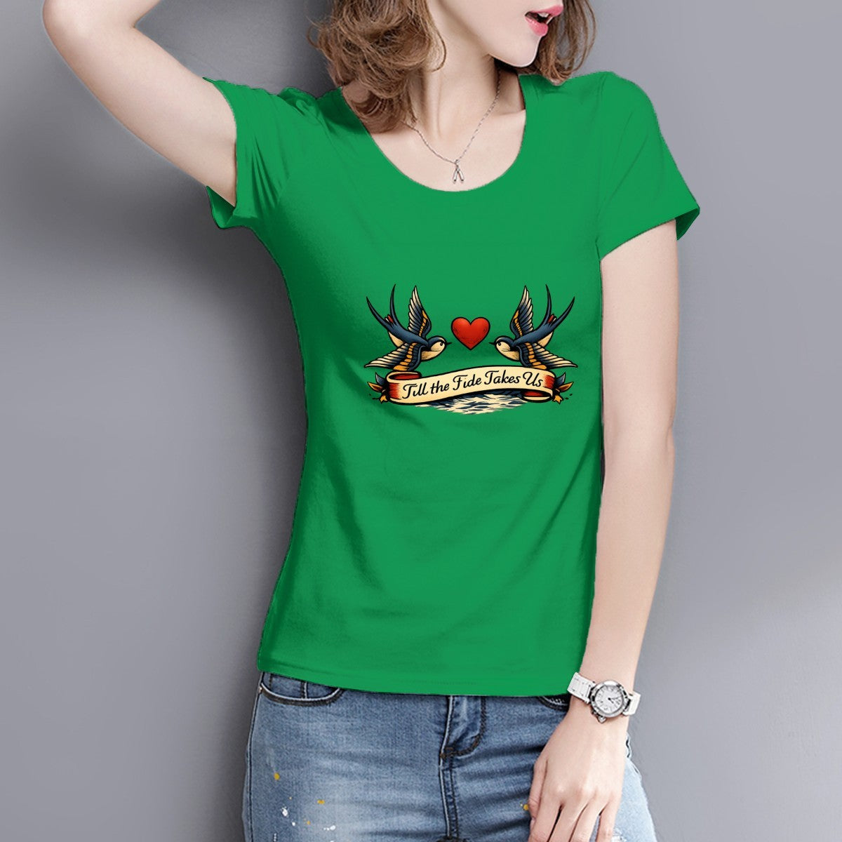 Person wearing a green t-shirt with a graphic design on a gray background