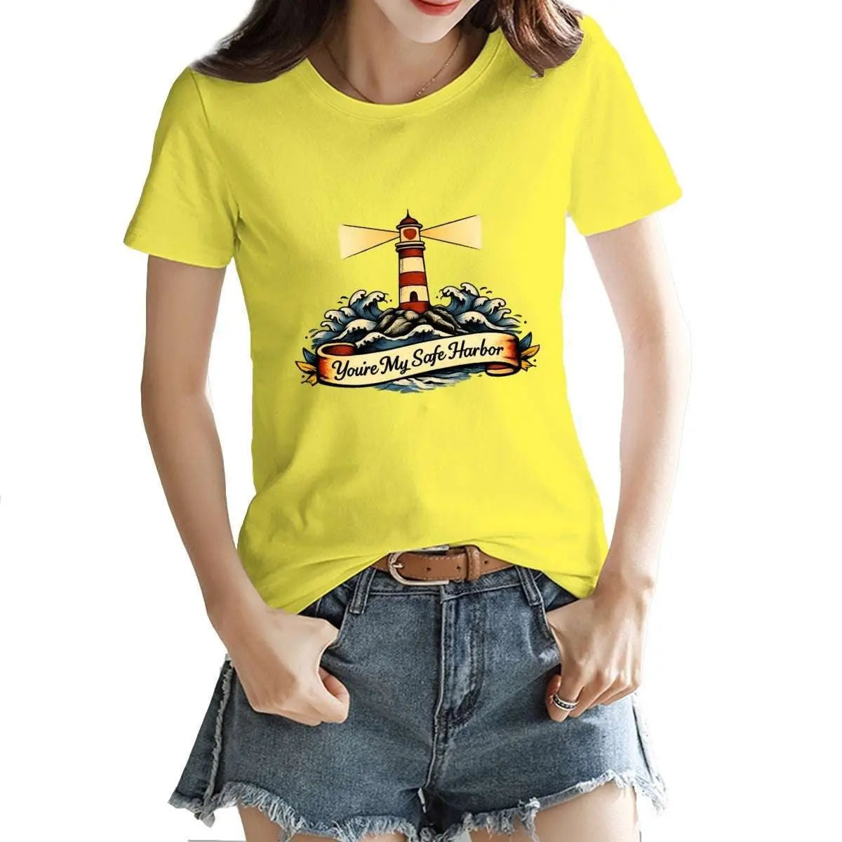 Person wearing a yellow t-shirt with a lighthouse design on a white background
