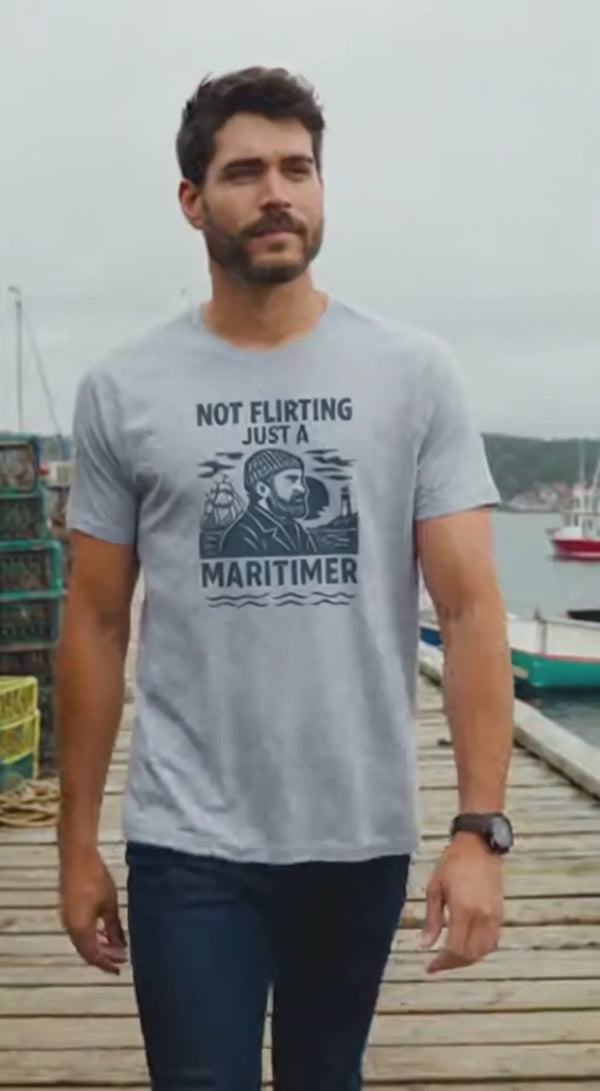 guy walking on dock wearing a grey not flirting just a maritimer t-shirt